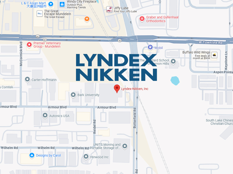 A digital map shows the location of Lyndex-Nikken, Inc. on Armour Blvd in Mundelein, Illinois, with nearby streets, businesses, and landmarks labeled. A red map pin marks the company&rsquo;s address.