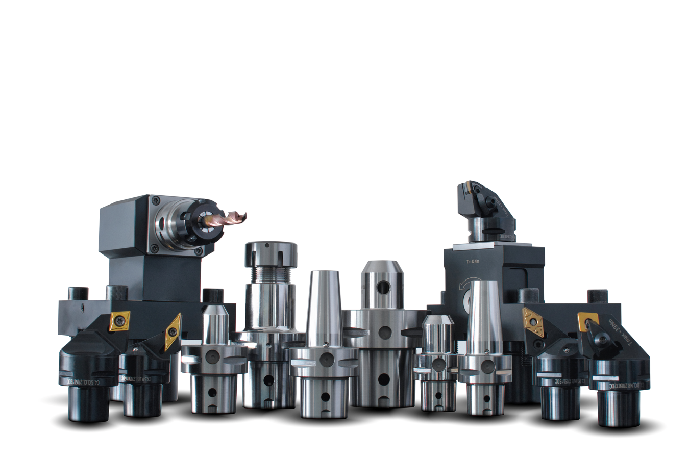 Lyndex-Nikken_Polygonal Shank Toolholders_2400x1600 A collection of various metal tool holders and cutting tools for CNC machines, arranged in a row against a white background. The tools vary in size and shape, with polished and matte surfaces.