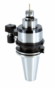 A right angle head with a collet and a small drill bit attached.
