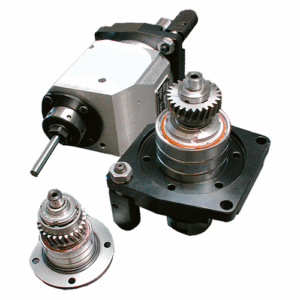 Three internal live tool components, including a silver gearbox with a protruding shaft and two gear assemblies with visible gears and metal housings, are arranged on a white background.