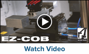 Close-up of a robotic arm operating machinery, with text EZ-COB and a Watch Video button below. A machine tending icon appears in the lower right corner. A play button overlay is centered on the image.
