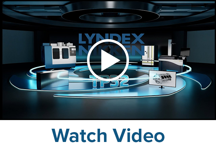 A showroom displays various industrial machines and equipment with Lyndex-Nikken TP32 in large letters. A play button icon overlays the center, above the text Watch Video at the bottom.