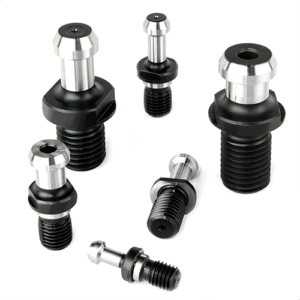 A group of six Retention Knobs of varying sizes are arranged upright and lying down on a white background.