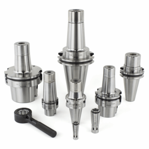 Six VC Collet Chucks of varying sizes are arranged upright on a white background, accompanied by two metal collets and a black spanner wrench placed in the foreground.