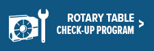 RT-Check-Up-Program-Side-Button White icon of a rotary table and a wrench next to the text “Rotary Table Service and Installation Check-Up Program” with a right arrow, all on a blue background.